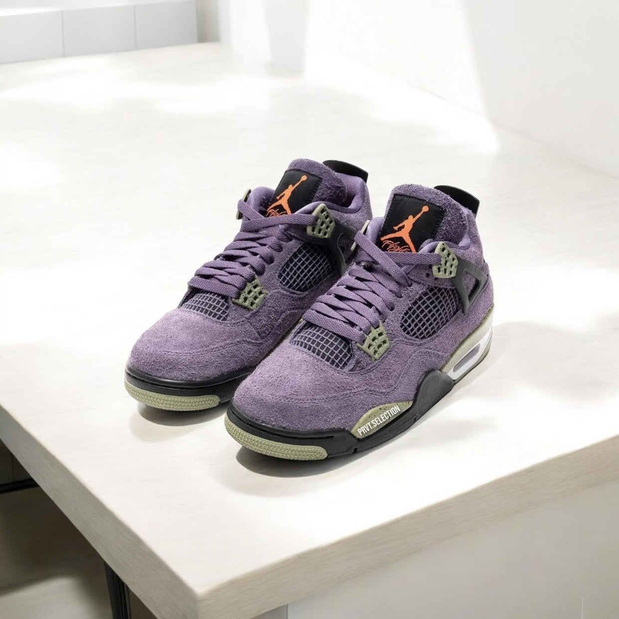 Jordan 4 Retro Canyon Purple (Women's)