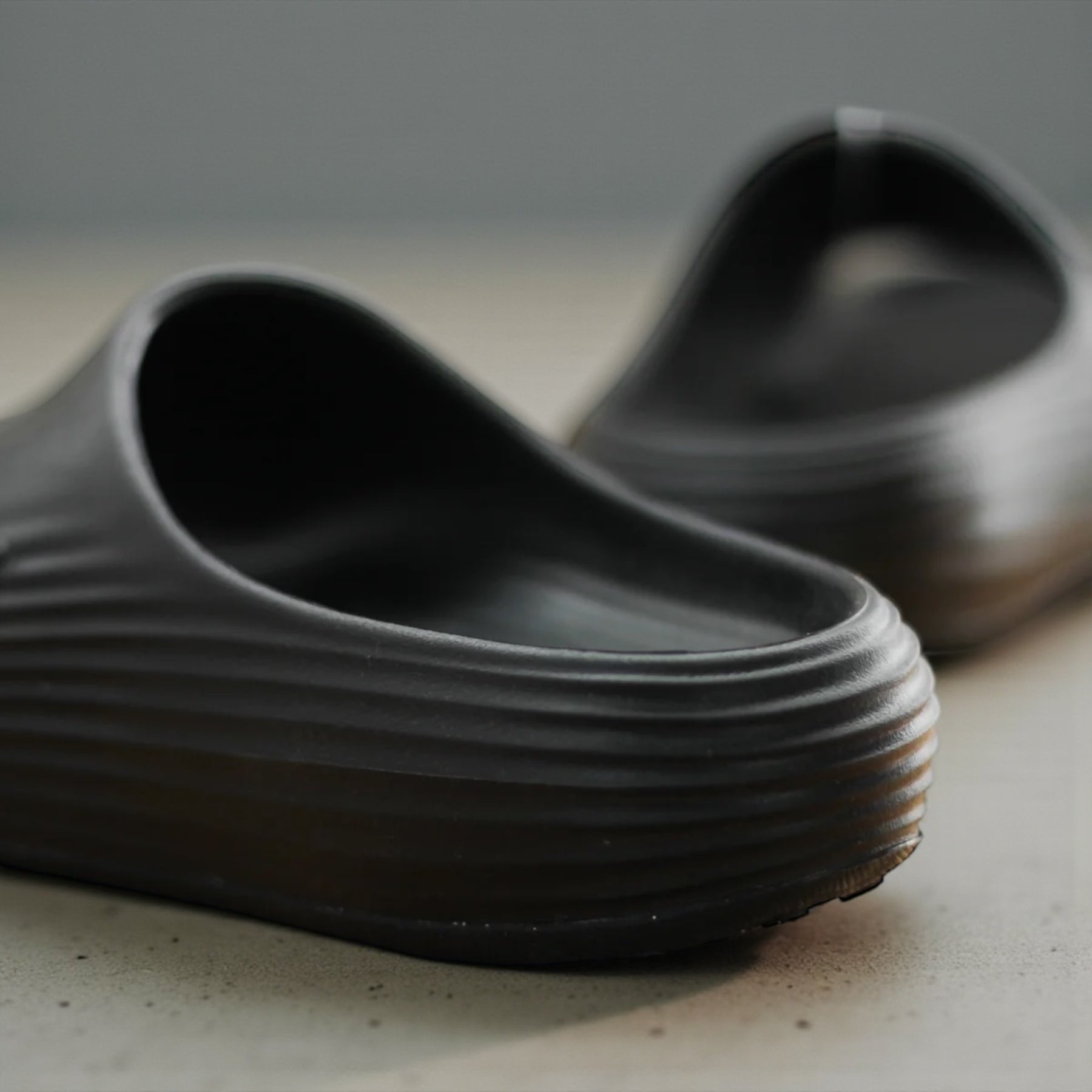 NIKE REACTX REJUVEN8 SLIDE "BLACK/BLACK-BLACK"