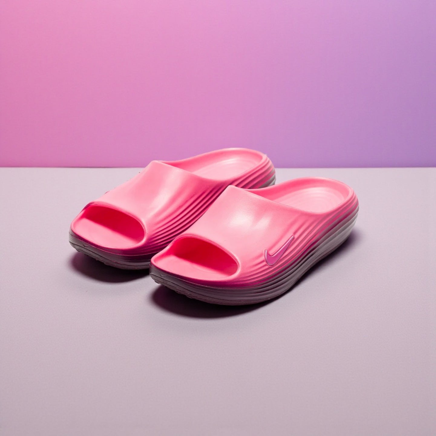 Nike ReactX Rejuven8 Slide in Pink WMN Spell/Bordeaux