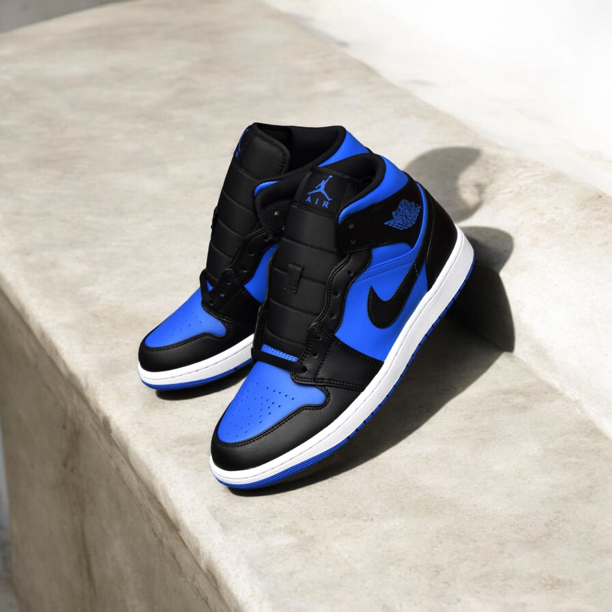 Jordan 1 Mid Noir Royal Métallisé