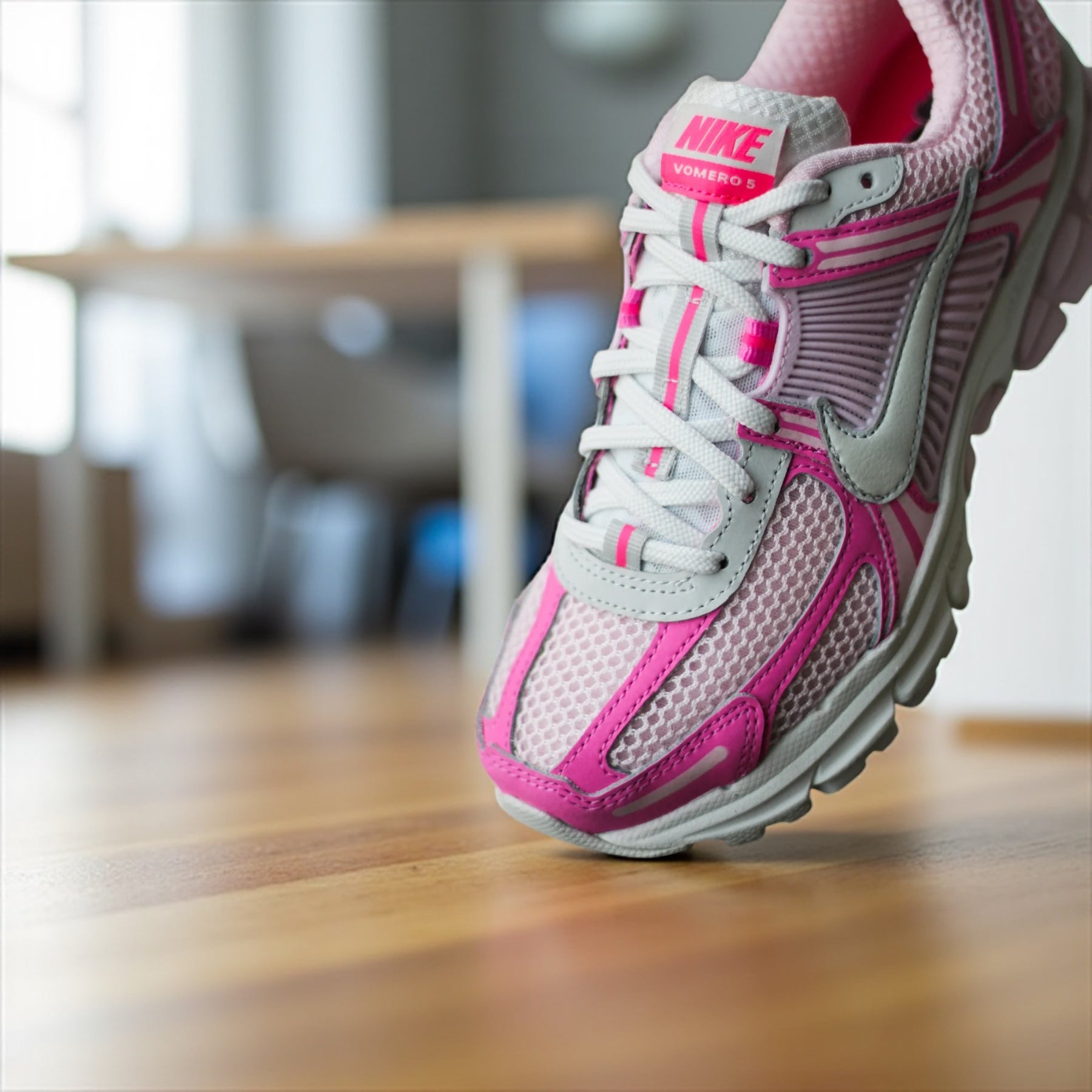 pink and white nike zooms