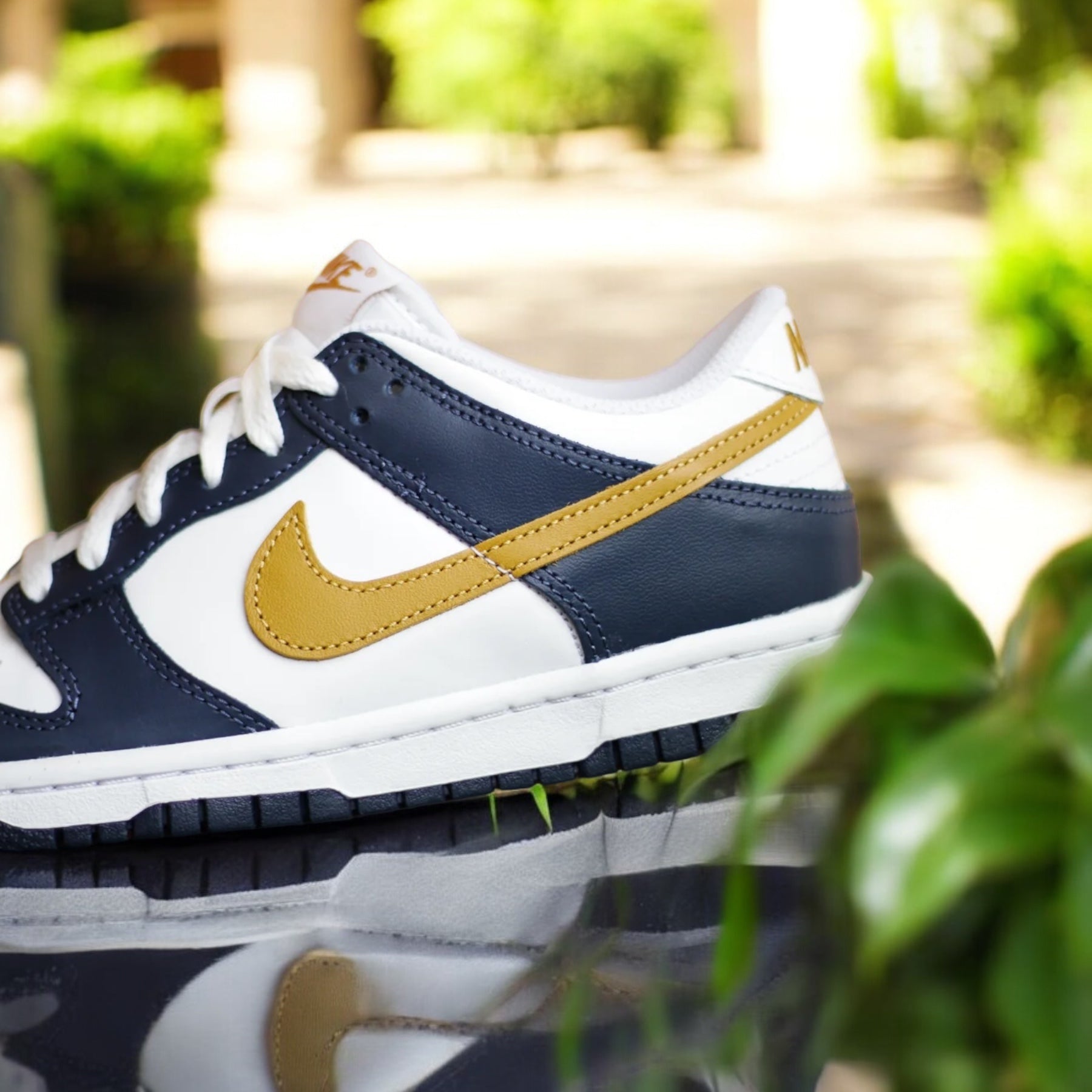 navy and gold nike